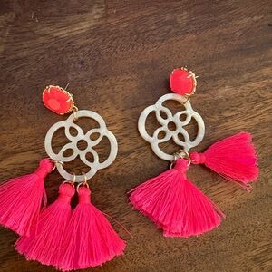 Lilly Pulitzer earrings with mother-of-pearl emblem.